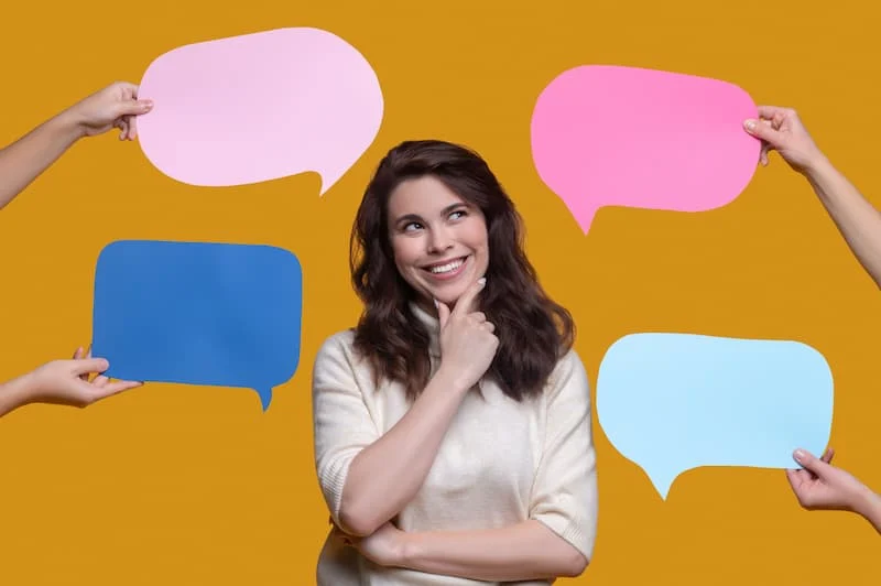 waist up portrait smiling cute lady pondering something surrounded by hands with four question answer signs 1